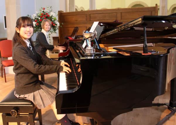 Mei Numazawa and Alison Sutton won the 'Any Age' duets in the two pianos class playing Rachmaninovs Andante