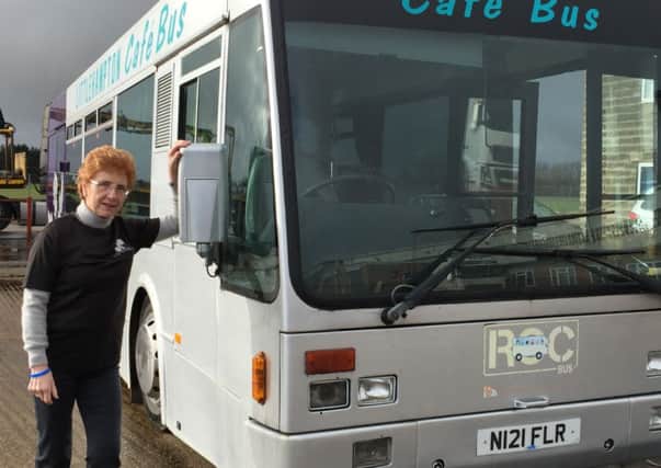 Jan Sheward pictured alongside the former café bus which will soon be a mobile hub for Cancer United
