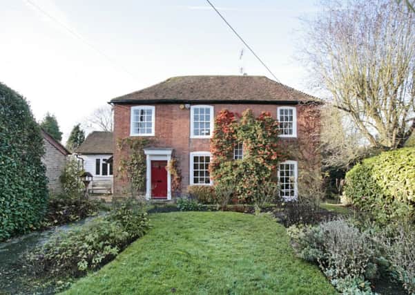 Hamptons International Horsham markets a listed attached cottage situated in Broadbridge Heath.