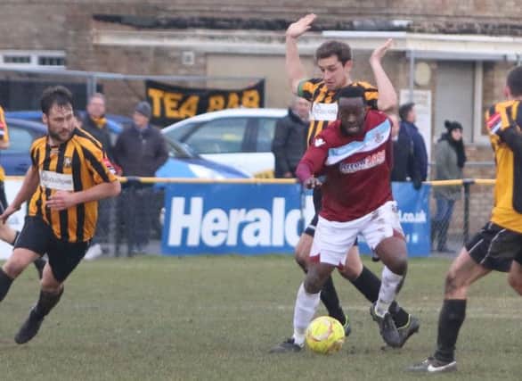 Ade Olorunda on the ball for Hastings United during the 1-0 defeat away to Folkestone Invicta. Picture courtesy Angela Brinkhurst