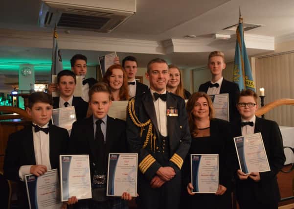 All the award winners and those who were promoted with Group Captain Richard Maddison OBE ADC MA RAF Station Commander RAF Odiham. SUS-150217-093454001