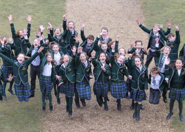 Year 6 students celebrating recent exam results