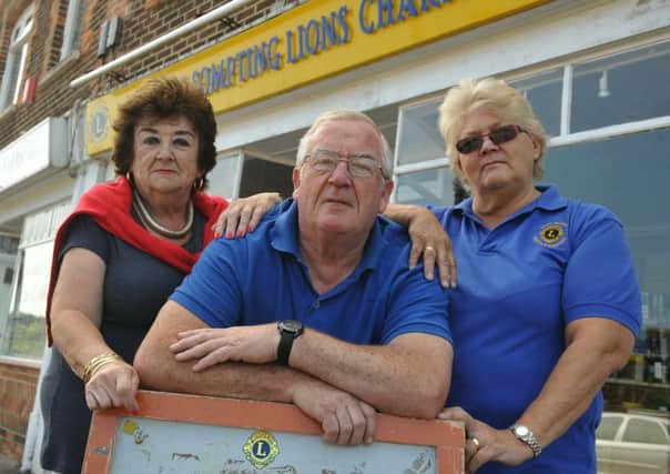 W25643H14

Lancing and Sompting Lions Pics. Yvonne Prosser Tony Redhead and Sandy Redhead outside the Lions Charity Shop in South Street Lancing SUS-140621-102140001