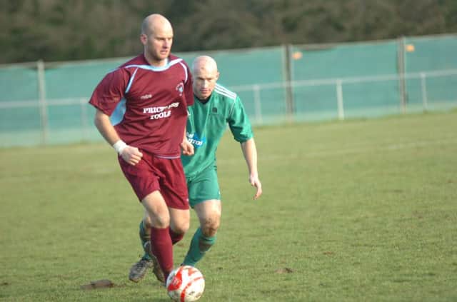 Little Common player-manager Russell Eldridge on the ball during the 2-1 win at home to Mile Oak on Saturday. Picture by Simon Newstead (SUS-150214-222740002)