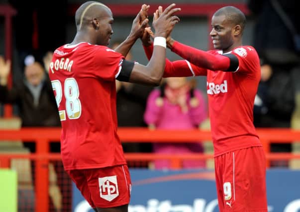 Izale McLeod scores for Crawley Town against Barnsley (Pic by Jon Rigby) PPP-150214-160732004