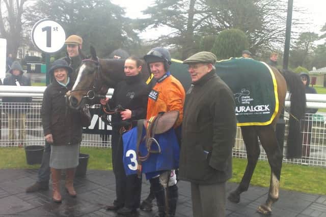 Connections celebrate Kilcooley's win in the National Spirit Hurdle