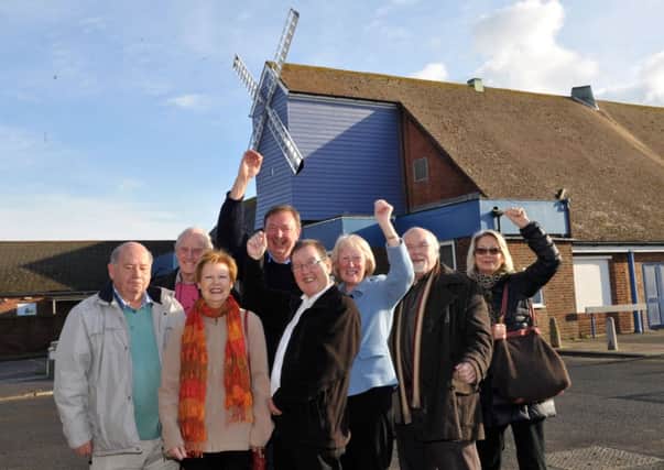 Campaigners celebrate the announcement in late 2013 that cinema would be returning to the Windmill Entertainment Centre