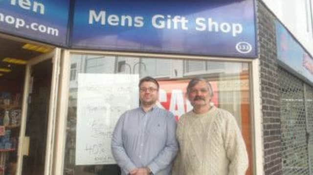 Michael Smith, of the Mens Gift Shop, pictured with father Rene Saarbach. The shop is closing after 13 years. SUS-150223-135134001