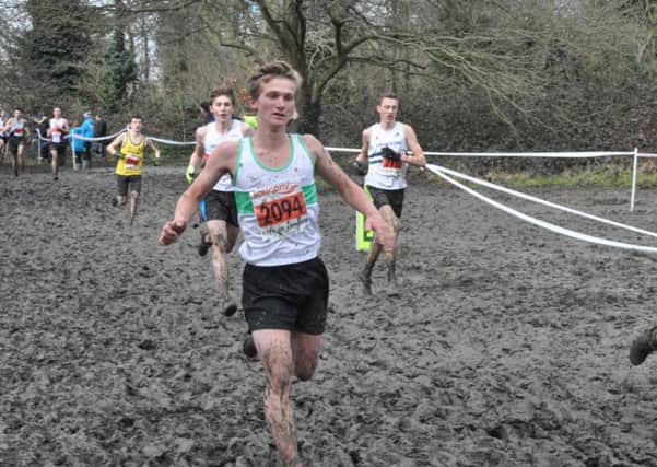 Sam Pink slogs through the mud in London Picture by Dave Reading