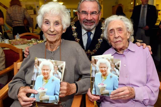 Irene Godfrey and  Ethel Brown celebrate their 100th birthdays with the mayor of Worthing Vic Walker Picture: Liz Pearce
