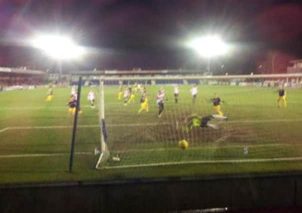 Doug Tuck's equaliser hits the net at Kingstonian   Picture by Martin Shaw