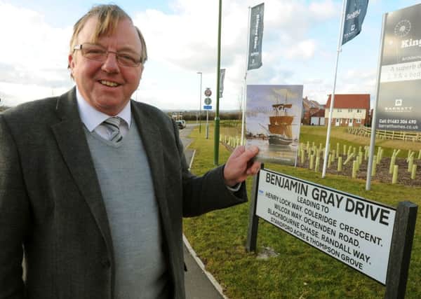Former Littlehampton mayor, councillor Alan Gammon, beside the Benjamin Gray Drive sign   D15081272