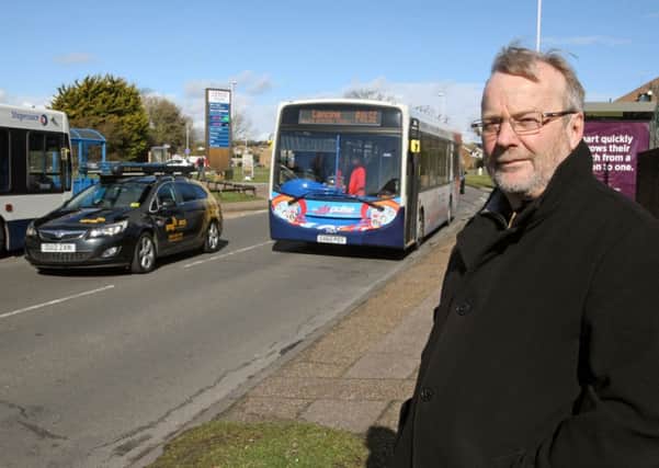 WH 030315 Cllr Sean Mcdonald calling for a new lay-by near Tesco store, Durrington to ease traffic congestion Photo by Derek Martin. SUS-150303-152407001