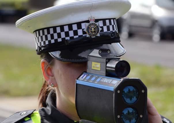 W24568H13 

Police Traffic Feature. PC Danni Dawes with Speed camera ENGSUS00120131106095753