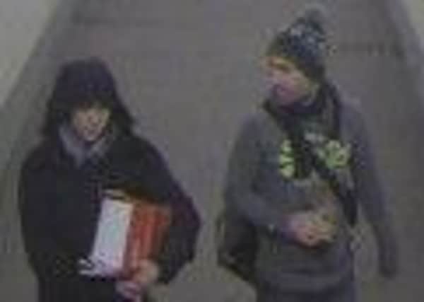 Transport police are hunting for these two men in connection with a suitcase theft from Barnham railway station  PHOTO: British Transport Police SUS-150227-163325001