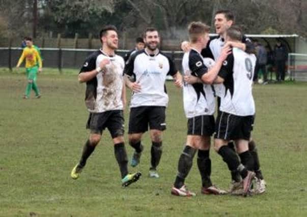 Pagham celebrate a goal in the comeback-win over Hailsham   Picture by Roger Smith