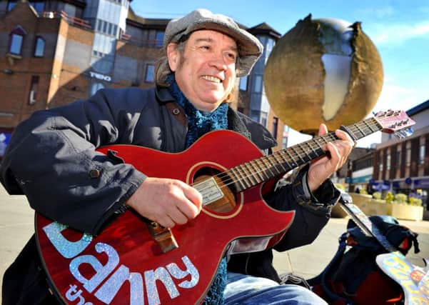 Danny McEvoy, Horsham busker is recording Eurovision songs. JPCT. Pic Steve Robards SUS-150903-161634001
