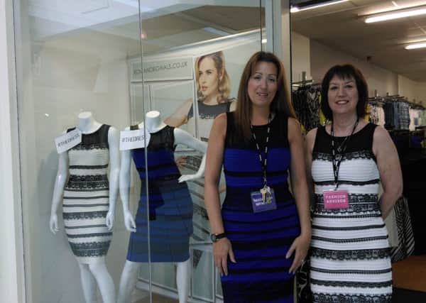 Horsham Roman Originals manager Nicky Ferdinando and sales advisor Katy Neff modelling 'The Dress' which is at the centre of a debate over its colour
