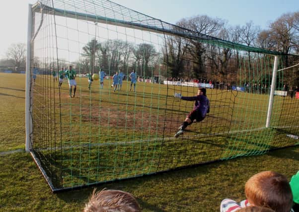 Joe Keehan slots away his penalty on Saturday. Picture by Colin Bowman