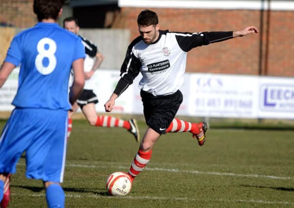 Horsham YMCA (black and white) v Newhaven. JPCT 07-03-15. Pic Steve Robards SUS-150903-162248001