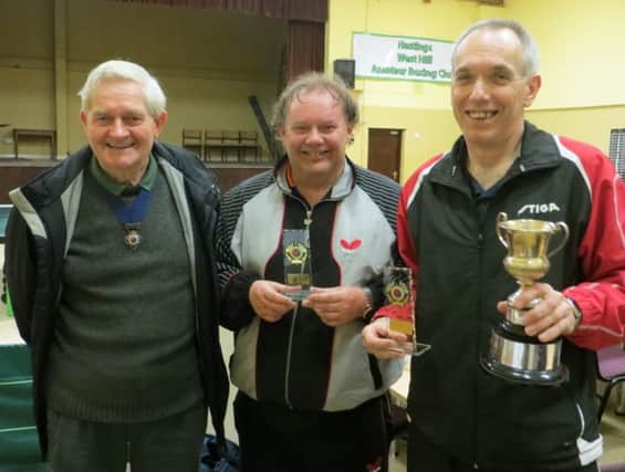 Men's doubles winners Ritchie Venner and Dave Butler with association president Roger Gillett. Picture courtesy Mick Lane