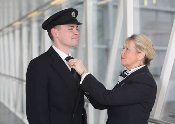Cathy Davis and her son Joe at London Heathrow Airport