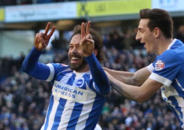 Albion's Inigo Calderon and Lewis Dunk celebrate a goal. Picture by Angela Brinkhurst