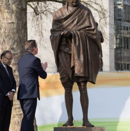 Prime Minister David Cameron at the unveiling of the new Mahatma Gandhi statue in Parliament Square, London. Daniel Leal-Olivas/PA Wire