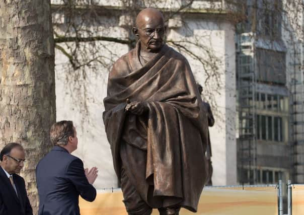 Prime Minister David Cameron at the unveiling of the new Mahatma Gandhi statue in Parliament Square, London. Daniel Leal-Olivas/PA Wire