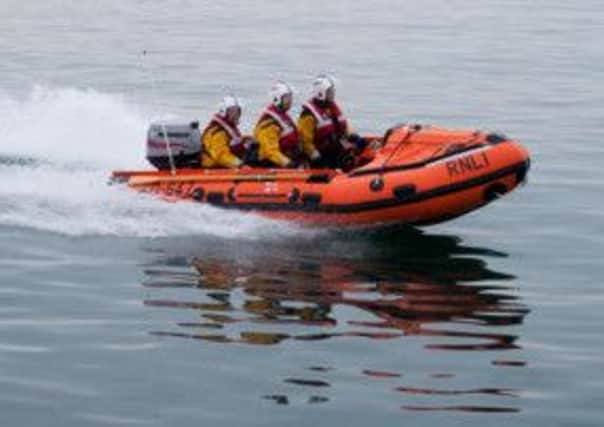 Shoreham's inshore lifeboat crew ENGSUS00120121008180000