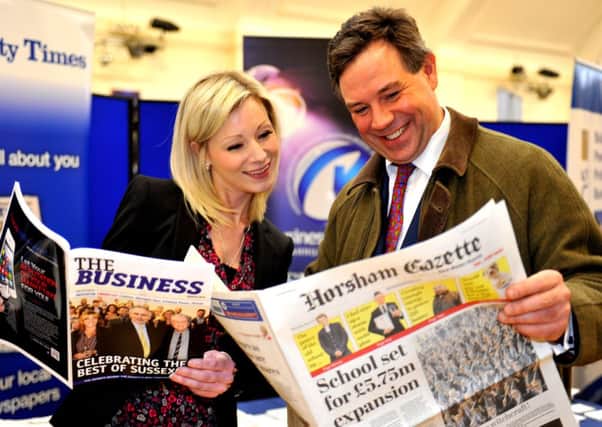 Microbiz at Horsham. Susie Marshall with Jeremy Quin (Hosham Conservative parliament candidate holding a copy of the County Times' sister title the Horsham Gazette). JPCT. Pic Steve Robards SUS-150316-101855001