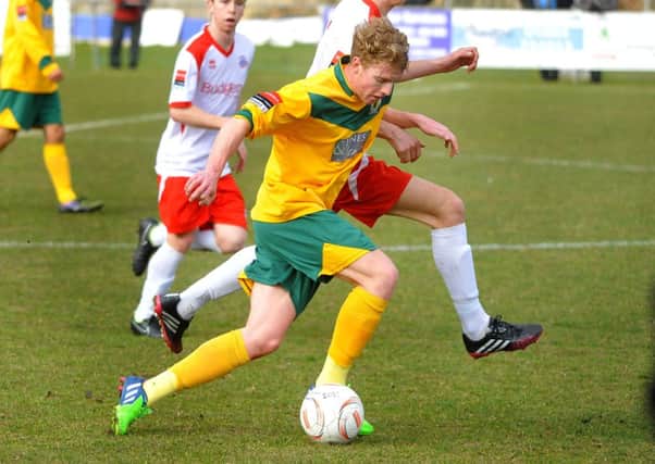 Football: Ryman League South Division: Horsham (yellow) v Whitstable Town. Pic Steve Robards SUS-150316-114145001