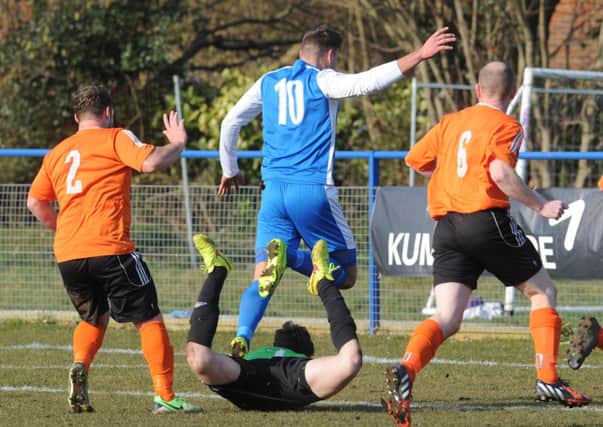 Haywards Heath FC V Midhurst 14/3/15 Nathan Cooper on the attack (Pic by James Rigby) SUS-150316-104131008