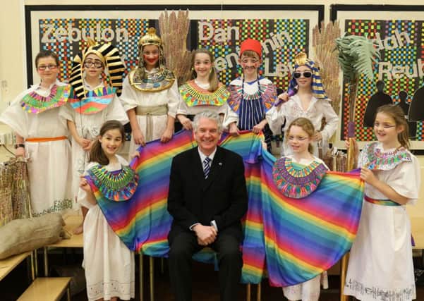 Georgian Gardens Primary School' head teacher, Bill Molloy celebrates his final days before retiring. Mr Molloy is pictured with children in the school's Joseph and His Amazing Tecnicolor Dreamcoat production