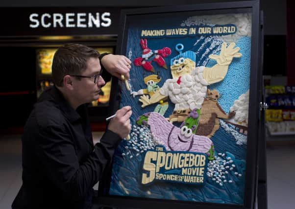 Empire Cinemas has commissioned food artist Mark Northeast to create a pick 'n' mix poster for The SpongeBob Movie: Sponge Out of Water. The image is on display at Empire Cinemas, Walthamstow this week.

PIX.TIM ANDERSON  FREE USAGE SUS-150325-091820001