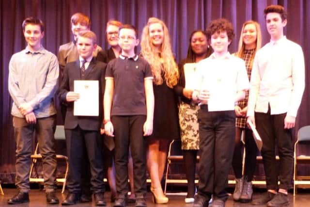 Members of the Arun Youth Council collecting their awards