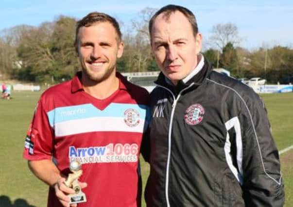 Hastings United manager Nigel Kane (right) with midfielder Sam Adams. Picture courtesy Joe Knight