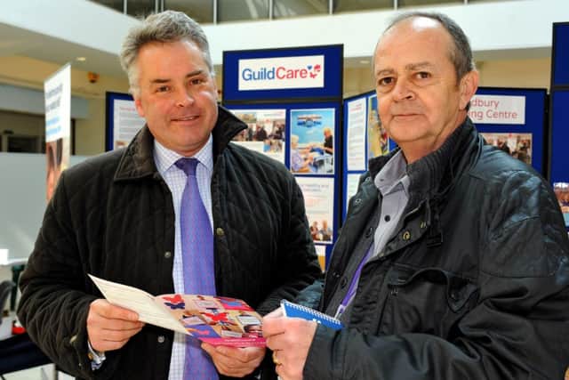 Tim Loughton (left), hosts the Pensioners Fair at the Guildbourne Centre, Worthing. WH. Pic Steve Robards SUS-150322-162359001