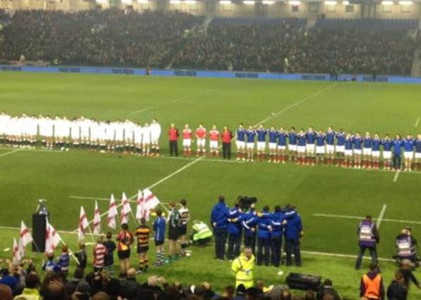 England and France line up for anthems at a packed Amex Stadium