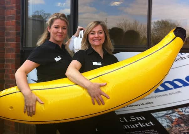 Sarah Aslin and Mel McMahon with their inflatable banana outside the County Times office