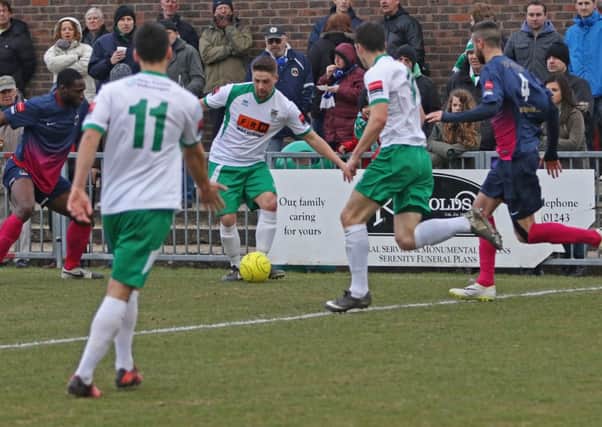 Terry Dodd - pictured with the ball at his feet against Grays - was the goal hero at Witham   Picture by Tim Hal