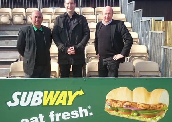 Matthew Cates (Subway) is centre with Russ Rego (BHTFC Commercial Manager) on the left and Kevin Newell (BHTFC Chairman) on the right.