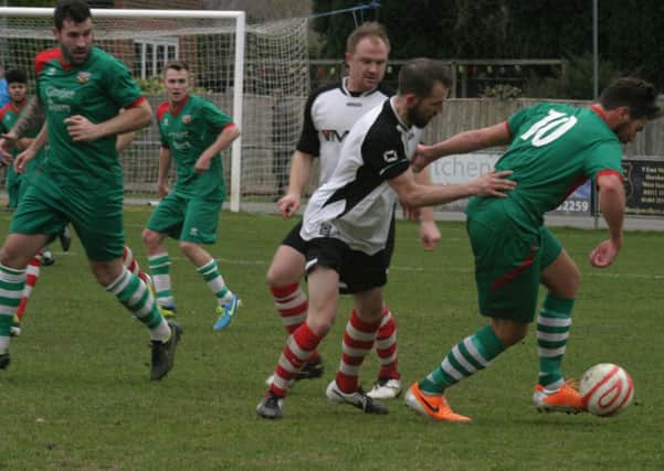 Pagham No10 Howard Neighbour on the ball at Horsham YMCA   Picture by Clive Turner