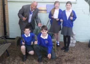 Rustington Community Primary School children planting their bulbs
