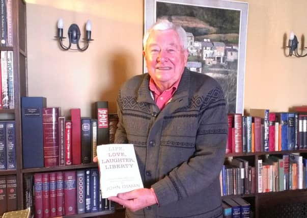 Former journalist John Osman with his book, Life, Love, Laughter, Liberty