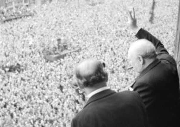 Winston Churchill waves to the crowds on VE Day. Picture: Imperial War Museum