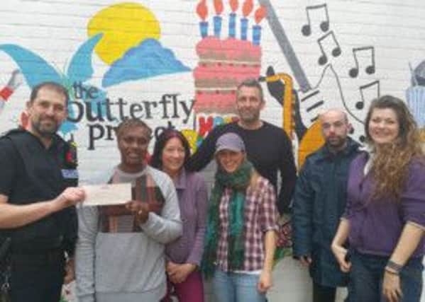 Horsham police present a cheque to the Butterfly Project