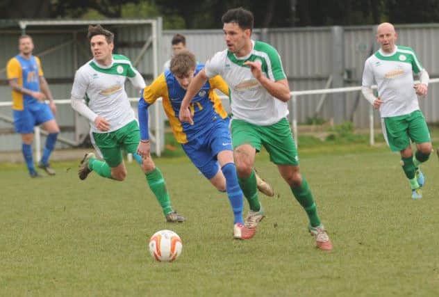 Michael Frangou, Josh Case and Daren Pearce in action for City against Eastbourne  Picture by Louise Adams