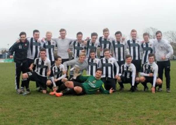 Pagham under-18s celebrate their title win  Picture by Roger Smith