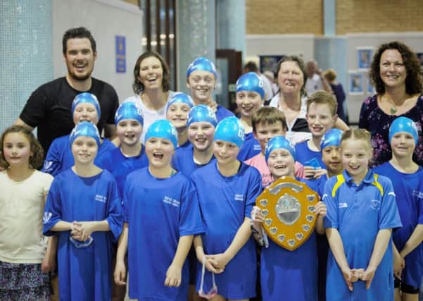 West Dean's swimmers celebrate their schools victory